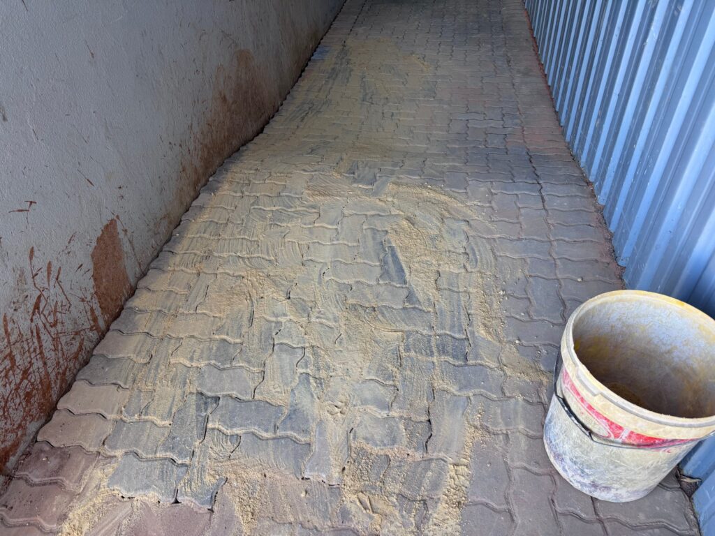 Paving sanded and compacted