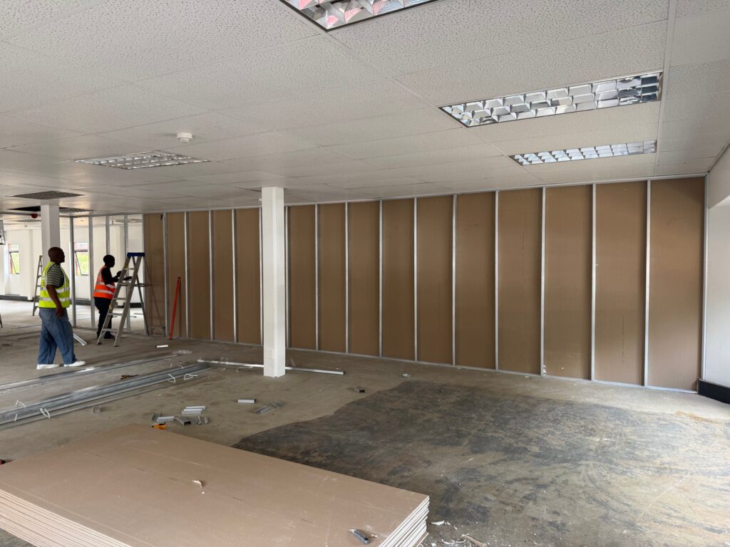 Open-plan partition wall installation - NRMM Projects